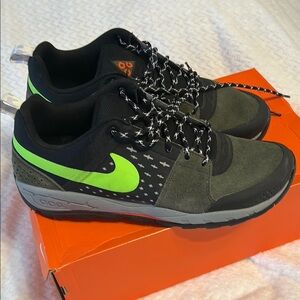 Nike Black and Green Trail Sneakers with Rugged Design